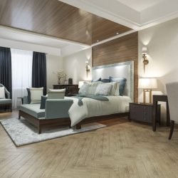 classic-luxury-bedroom-suite-in-hotel-with-tv-and-working-table-and-european-style-furniture